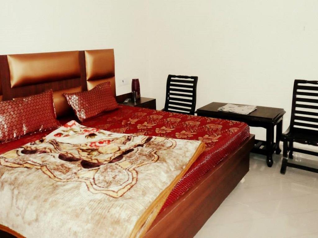 Asha Guest House Amritsar Habitación foto